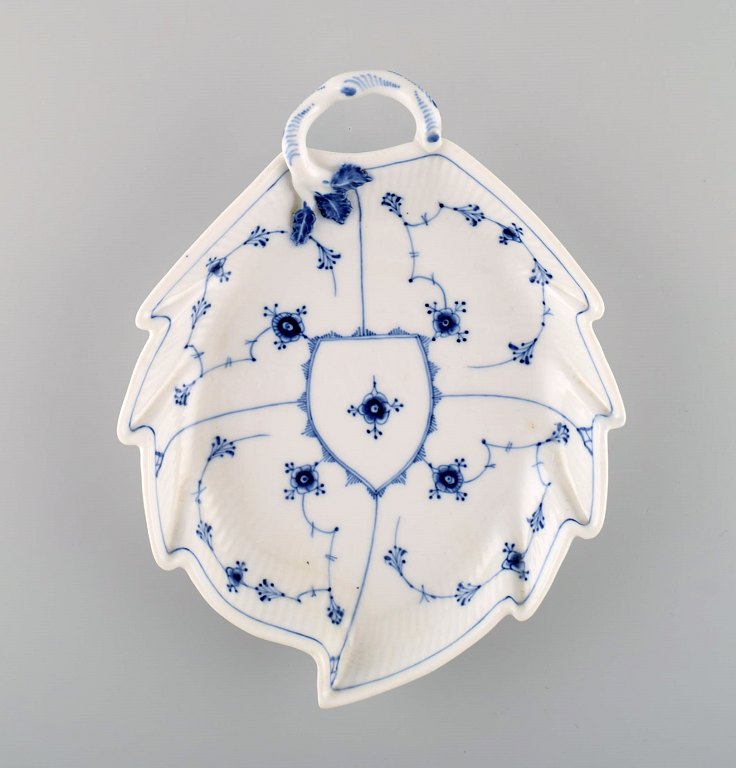 Rare antique Royal Copenhagen Blue Fluted Plain leaf-shaped dish with handle. 
Mid-19th century.

