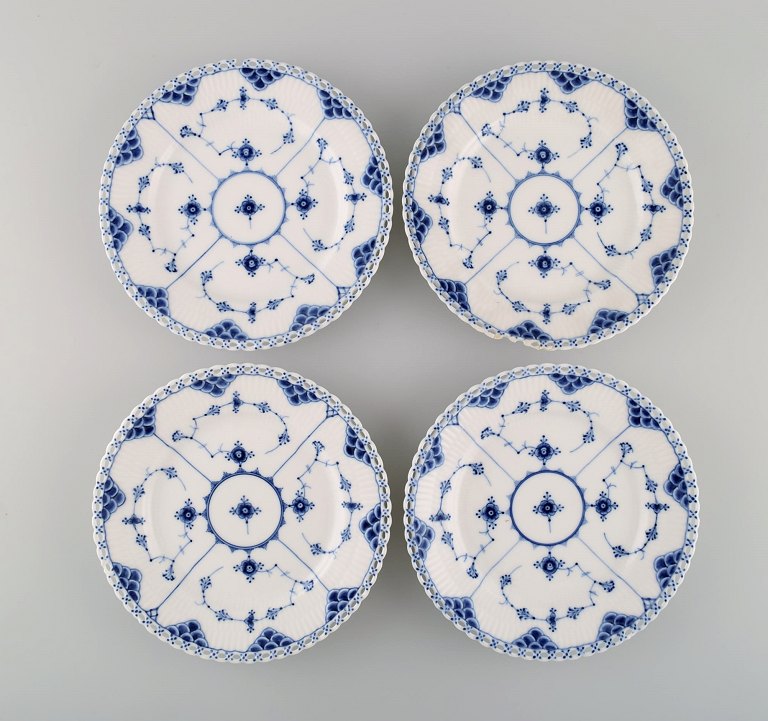 Four antique Royal Copenhagen Blue Fluted Full Lace plates. 19th century.
