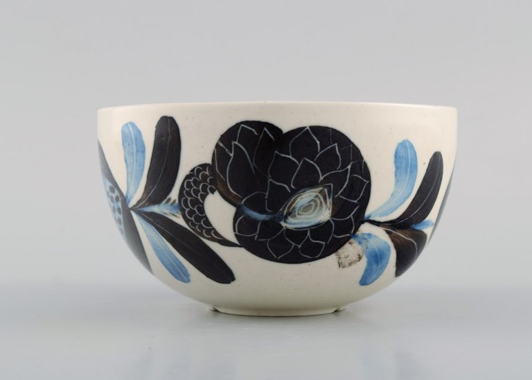 Stig Lindberg (1916-1982) for Gustavsberg. Rare bowl in glazed stoneware with 
hand-painted flowers. Dated 1975.
