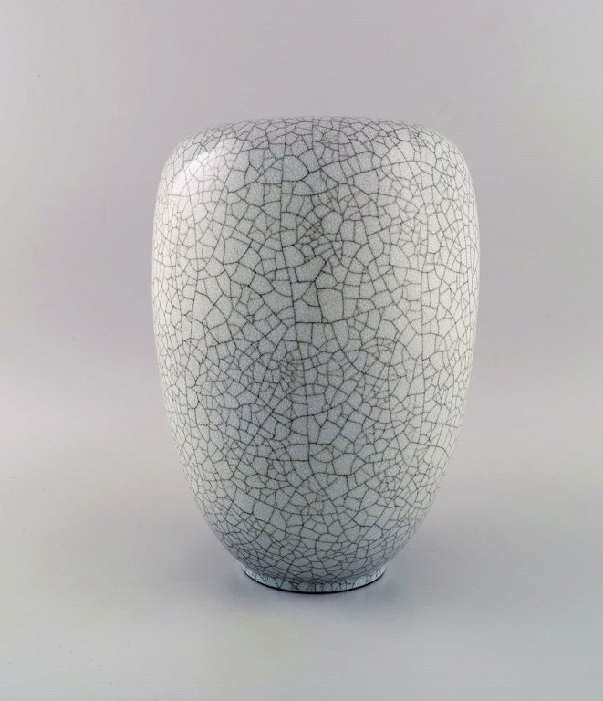 Karlsruhe, Germany. Vase in glazed stoneware. Beautiful crackle glaze. Mid-20th 
century.
