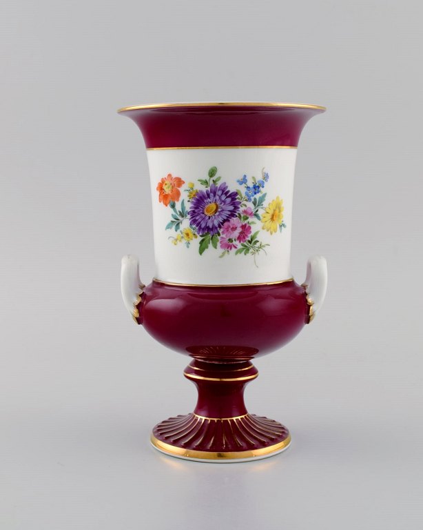 Antique Meissen porcelain vase with hand-painted flowers. Purple and gold 
decoration. Ca. 1900.
