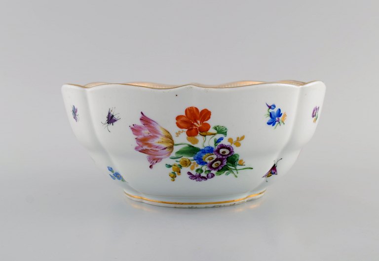 Antique Meissen porcelain bowl with hand-painted gold decoration, flowers and 
insects. 19th century.
