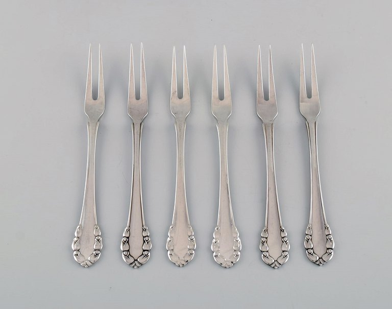 Six Georg Jensen Lily of the Valley cold meat forks in sterling silver.
