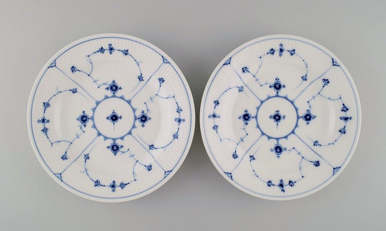 Two antique Royal Copenhagen Blue Fluted Plain dinner plates. 1890s. Model 
number 1/175.
