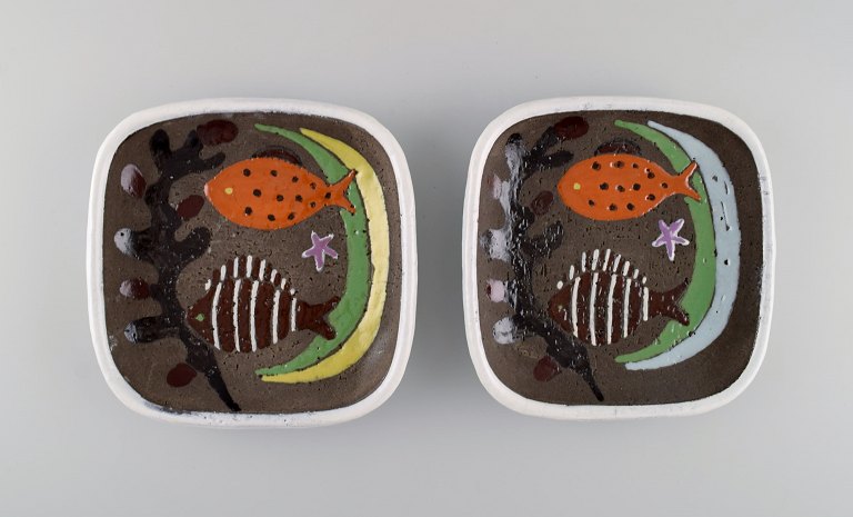 Two Upsala-Ekeby dishes in glazed stoneware decorated with fish. 1960s.
