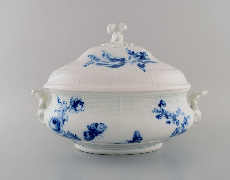 Antique Meissen soup tureen with handles in hand-painted porcelain. Blue flowers 
and butterflies. Late 19th century.
