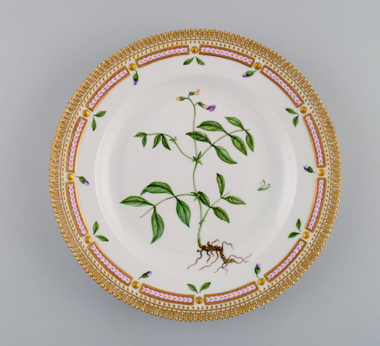 Royal Copenhagen Flora Danica dinner plate in hand-painted porcelain with 
flowers and gold decoration. Model number 20/3549.
