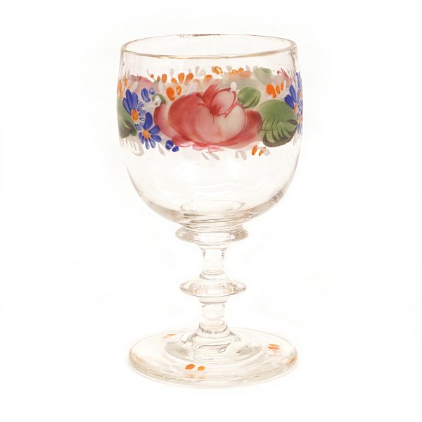 An enamel decorated wine glass. Circa 1860. H: 12cm