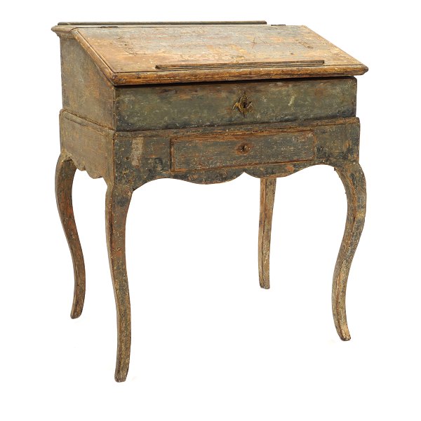 Rococo writing desk with cabriole legs. Scraped to it