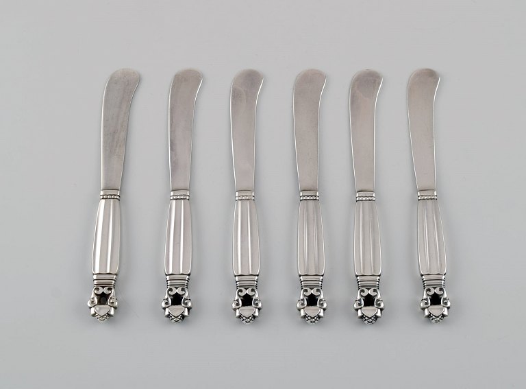 Six Georg Jensen Acorn butter knives in sterling silver.
