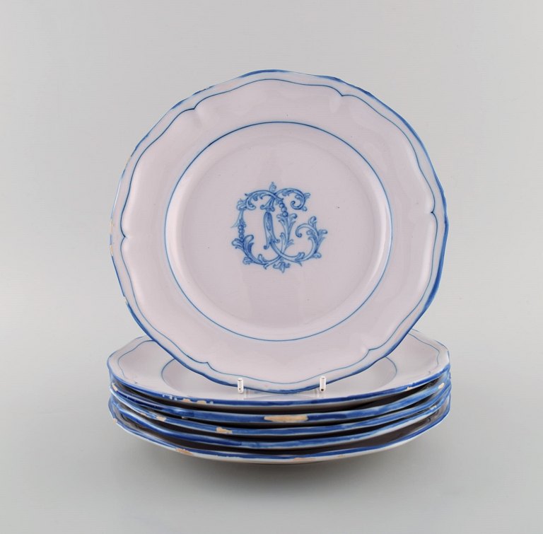 Emile Gallé for St. Clement, Nancy. Five antique plates in hand-painted faience. 
1870s / 80s.
