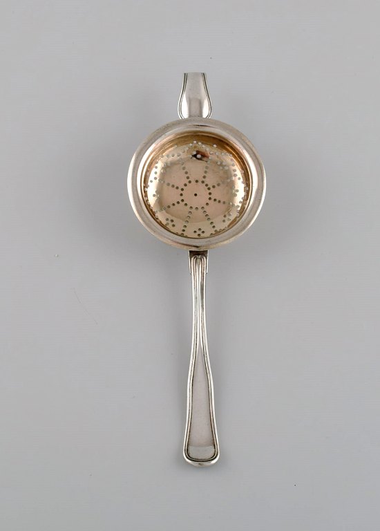 Danish silversmith. Antique silver (830) tea strainer. Dated 1873.
