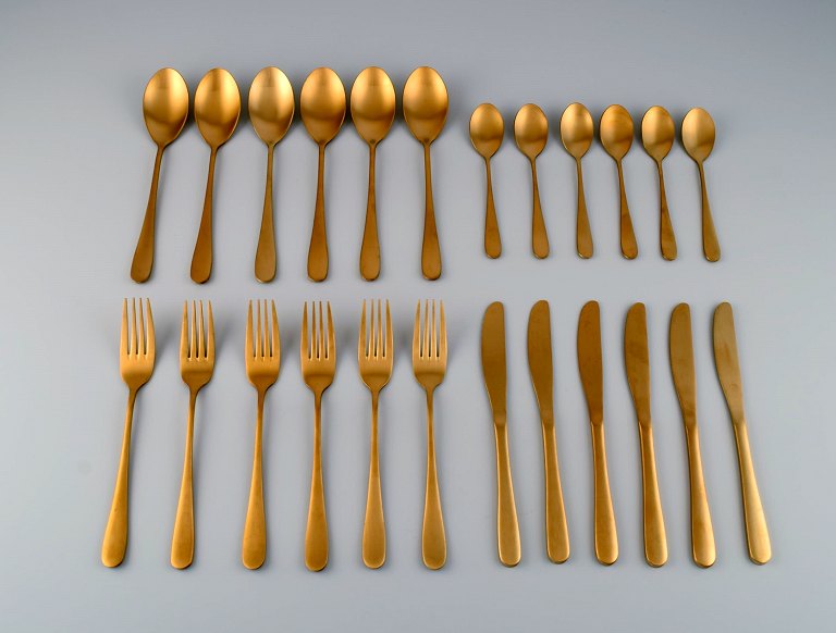 Lagerhaus, Sweden. Dinner service in brushed brass for six people. Swedish 
design, 21st Century.
