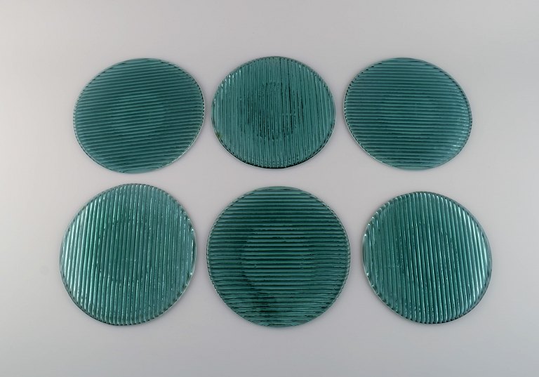 Per Lütken for Holmegaard. Six "Buffet" plates in blue-green mouth blown art 
glass. 1980s.
