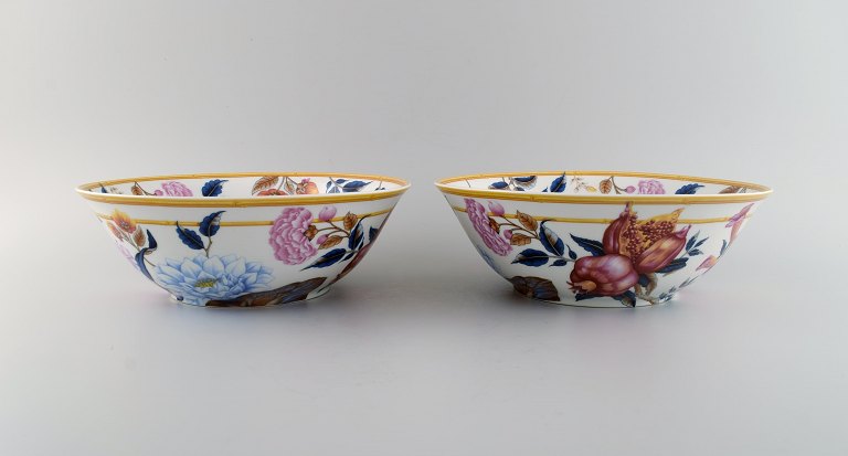 Porcelaine de Paris. "Aurore Tropicale". Two large porcelain bowls decorated 
with flowers and pomegranates. 1980s.
