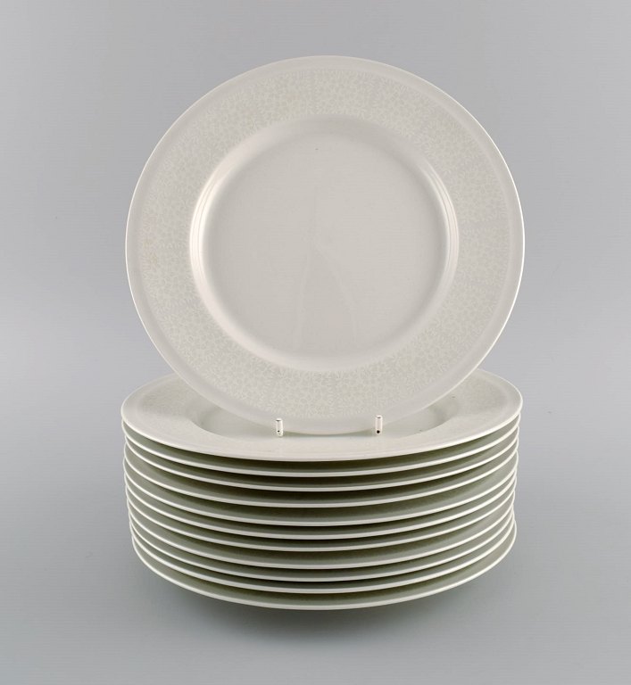 Raija Uosikkinen for Arabia. Twelve rare Pitsi lunch plates with floral 
decoration. Dated 1967-1974.
