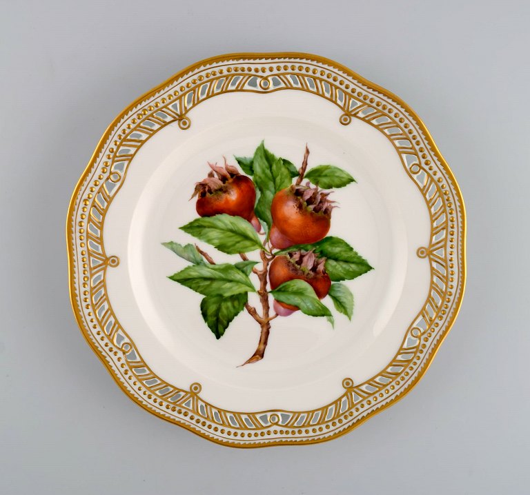 Royal Copenhagen Flora Danica fruit plate in openwork porcelain with 
hand-painted berries and gold decoration. Model number 429/3584. Dated 1968.
