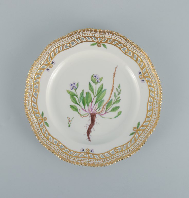 Royal Copenhagen Flora Danica openwork plate in hand-painted porcelain with 
flowers and gold decoration.