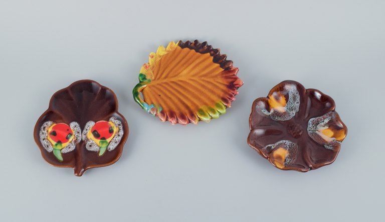 Vallauris, France, three leaf-shaped dishes in autumn colours.