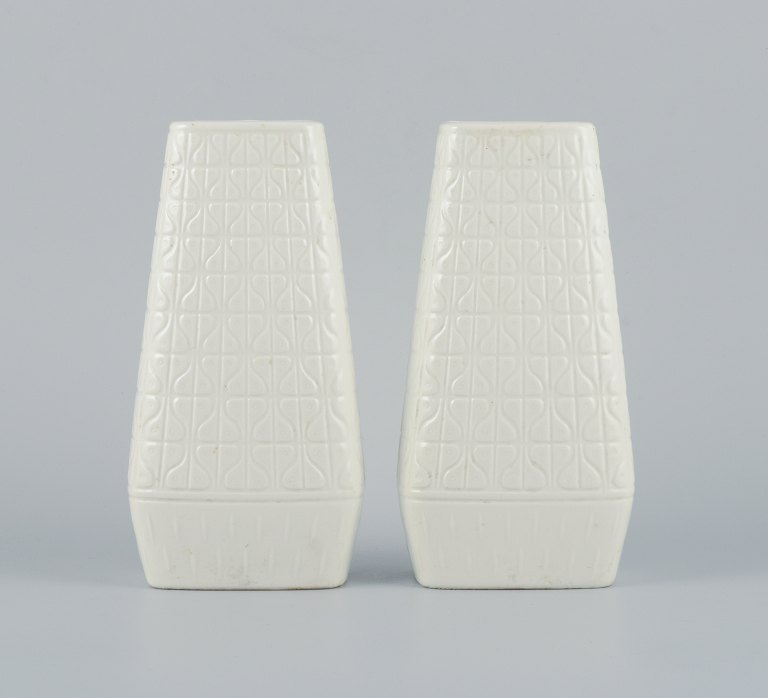 Gunnar Nylund for Rörstrand, a pair of "Domino" ceramic vases in white glaze, 
retro design with geometric shapes.