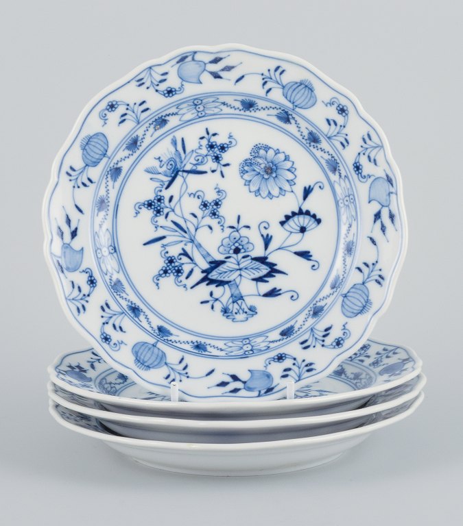 Meissen, Germany, four Blue Onion pattern plates.
Hand painted.