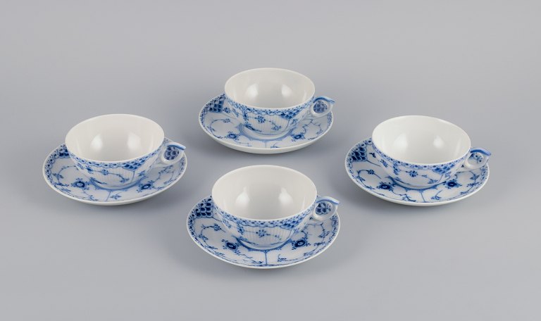 Royal Copenhagen, Blue Fluted half lace, four pairs of teacups.
Model 1/525.