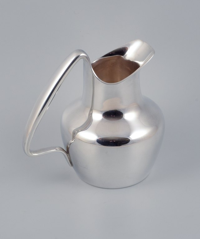 Henning Koppel for Georg Jensen, rare jug in sterling silver.