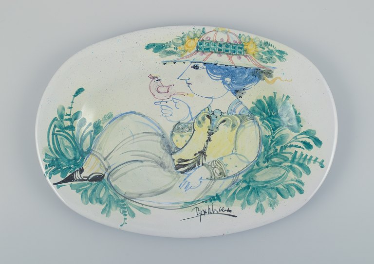 Bjorn Wiinblad (1918-2006), Denmark, Det Blaa Hus (The Blue House), large unique 
dish with a female motif.