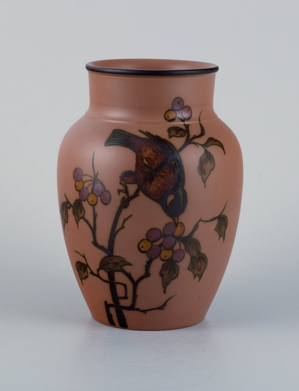 Hjorth Bornholm, Denmark, handmade ceramic vase decorated with a bird on a 
branch.