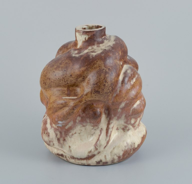 Christina Muff, contemporary Danish ceramicist (b. 1971).
Stoneware vase with cream/brown silk matte glaze. Hand-modeled and organically 
shaped with leaves and flower buds.
