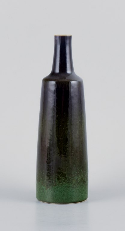 Carl Harry Stålhane for Rörstrand, bottle-shaped ceramic vase decorated in 
shades of green.