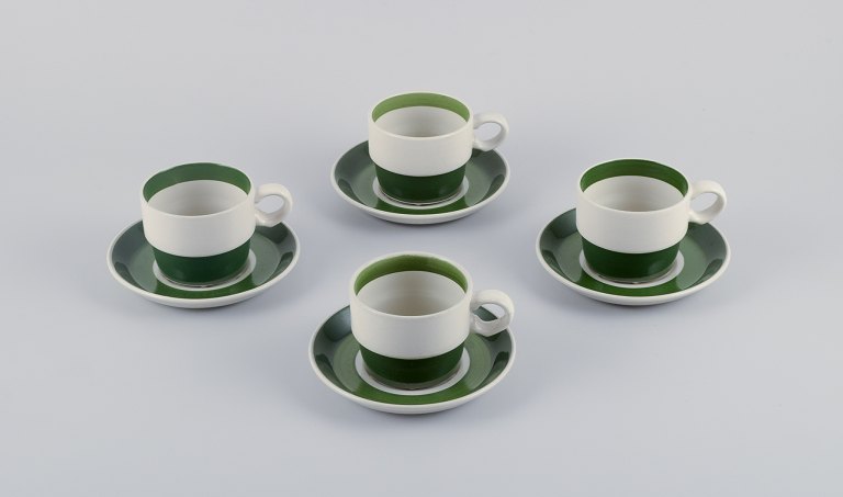 Stig Lindberg for Gustavsberg, Sweden, a set of four "Bodega" stoneware coffee 
cups with saucers.