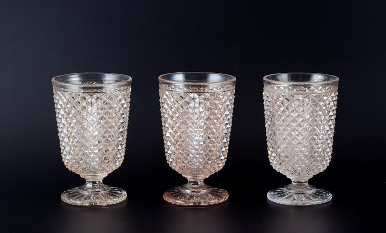 Baccarat, France, set of three Art Deco crystal wine glasses.