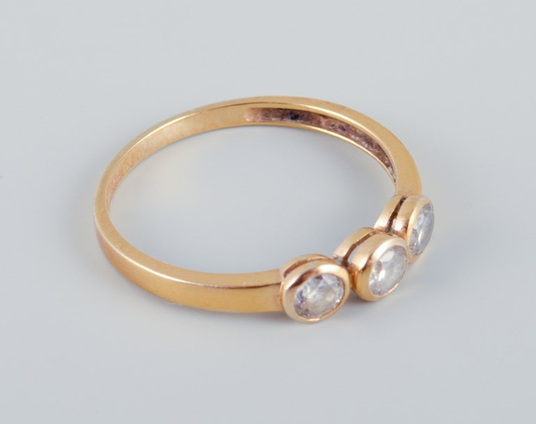 9 karat Chanti gold ring adorned with three semi-precious stones. Modernist 
design.