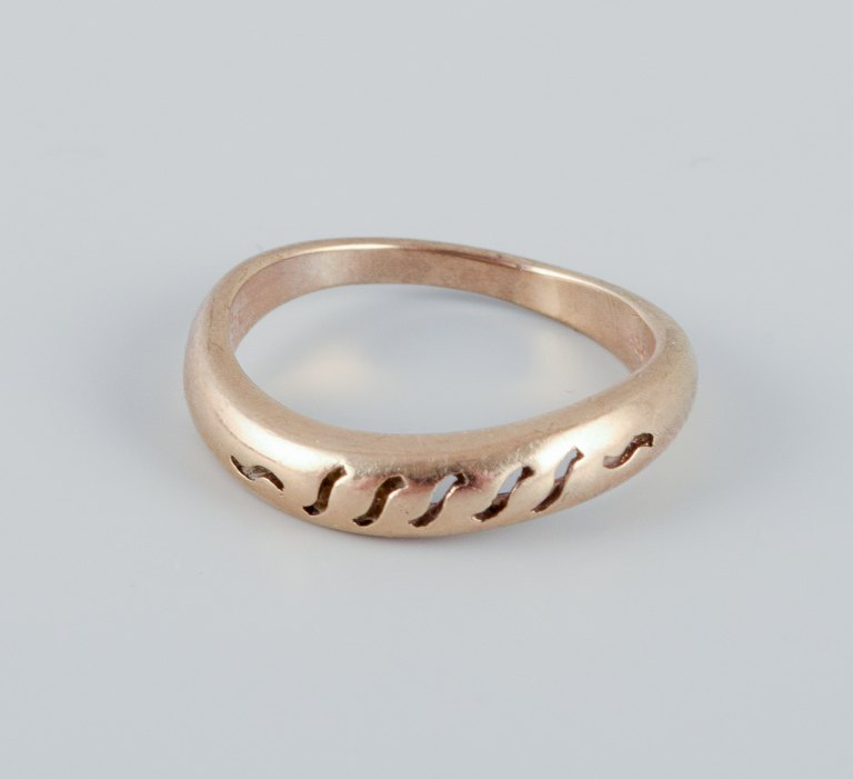 8 karat gold ring in a modernist design.