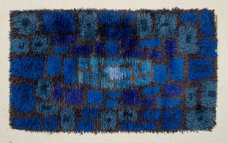Sweden, blue-toned rya carpet with geometric pattern.