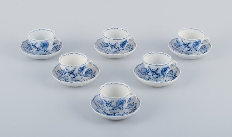 Meissen, Germany, a set of six pairs of Blue Onion pattern coffee cups 
(demitasse) with saucers. Hand-painted.