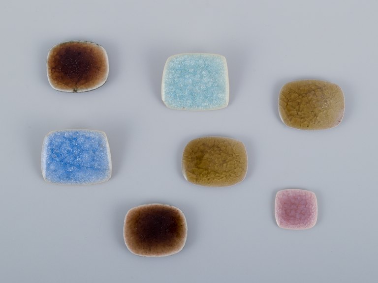 Ole Bjørn Krüger (1922-2007), Danish sculptor and ceramic artist. Seven unique 
brooches in glazed stoneware in blue and various colors.