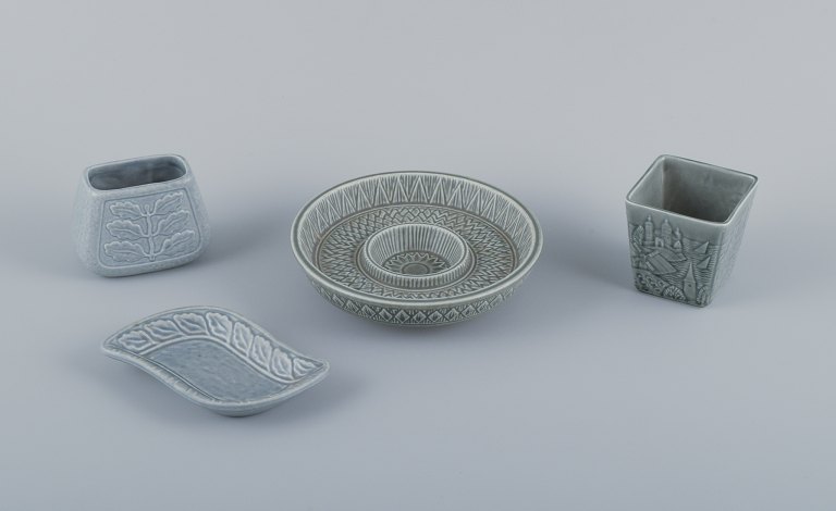 Gunnar Nylund for Rörstrand, four pieces of ceramic with glaze in gray tones. 
Two small vases and two bowls.