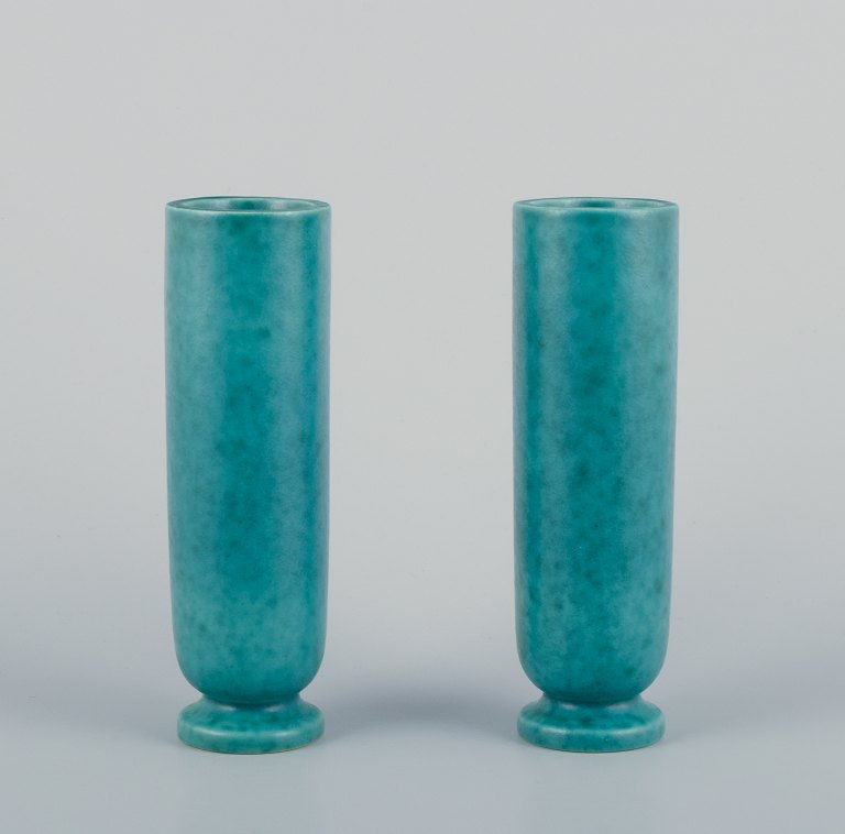 Wilhelm Kåge (1889-1960) for Gustavsberg, Sweden. A pair of tall and slender Art 
Deco ceramic vases with classic green glaze. From the Argenta series.