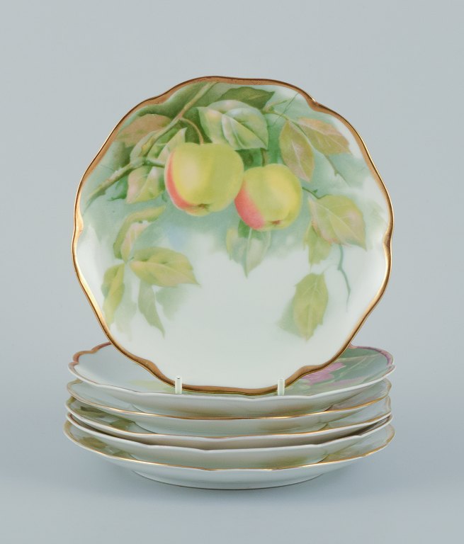 Rosenthal, Germany. A set of six porcelain plates with various fruit motifs. 
Gold rim.