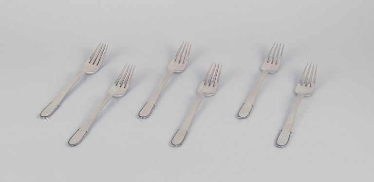Georg Jensen, a set of six Beaded dinner forks in 830 silver.