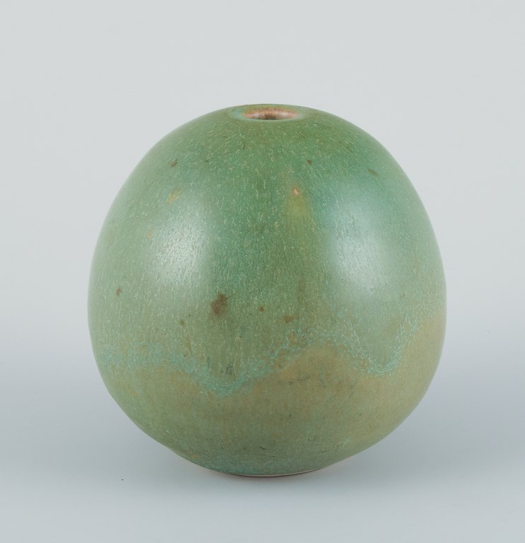 Preben Brandt Larsen, Danish ceramist. Unique ceramic vase with green-toned 
glaze. Egg-shaped.
