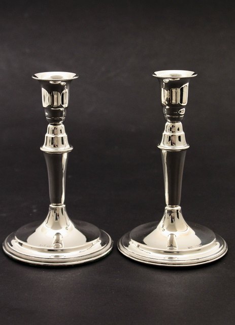 A pair of 830 silver candlesticks