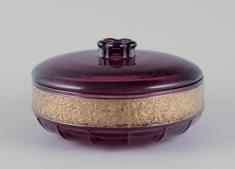 Moser, Czech Republic. Large covered bowl in art glass. Purple glass with gold 
motifs.