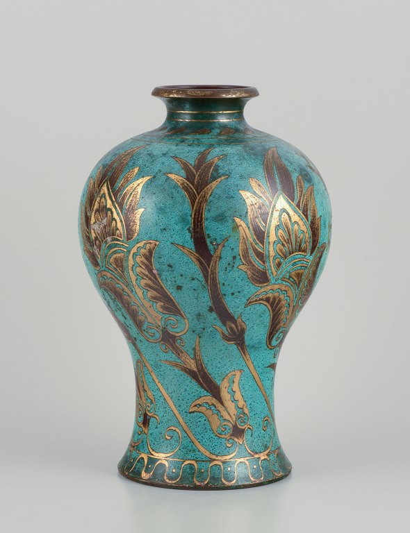 WMF (Württembergische Metallwarenfabrik), Germany. Large "Ikora" vase in brass 
decorated with gold floral motifs. Beautiful patina.