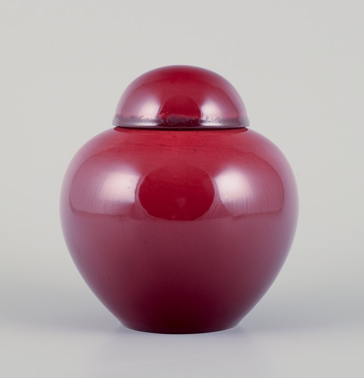Paul Millet for Sevres, France. Unique lidded ceramic jar with oxblood glaze.