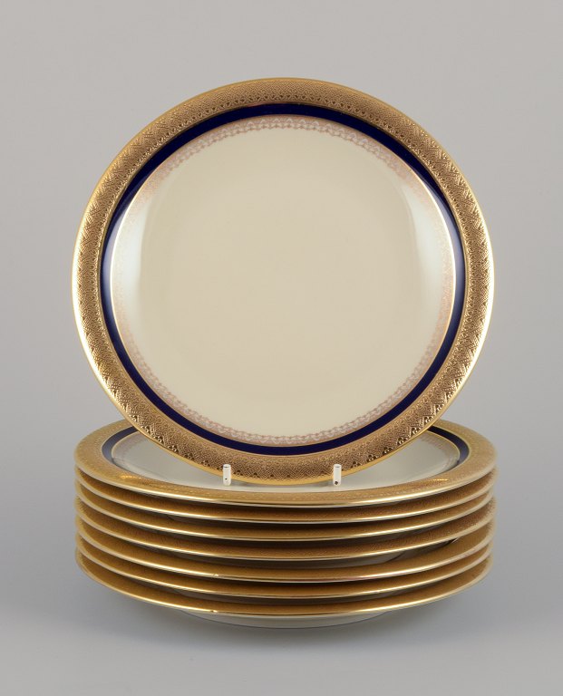Hutschenreuther, Germany. Eight plates from the "Margarete" series. 
Hand-decorated with gold and royal blue.