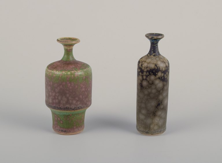 Rolf Palm (1930-2018), Swedish ceramist. Two unique miniature vases with glaze 
in blue-gray and green shades.