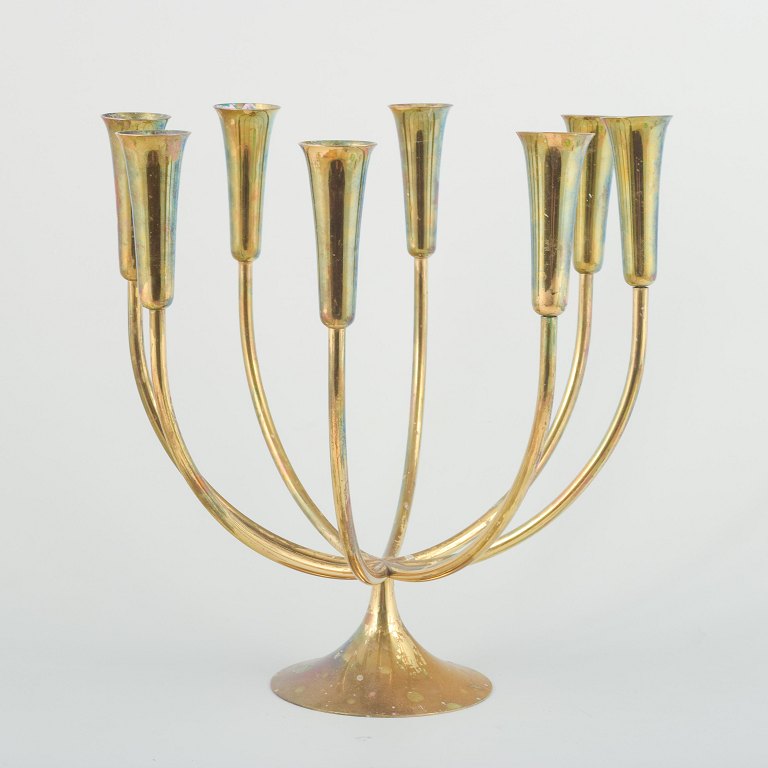 Dansk designer
Ottearmet stage, 1970’erne.
Kandelaber i messing med otte buede arme